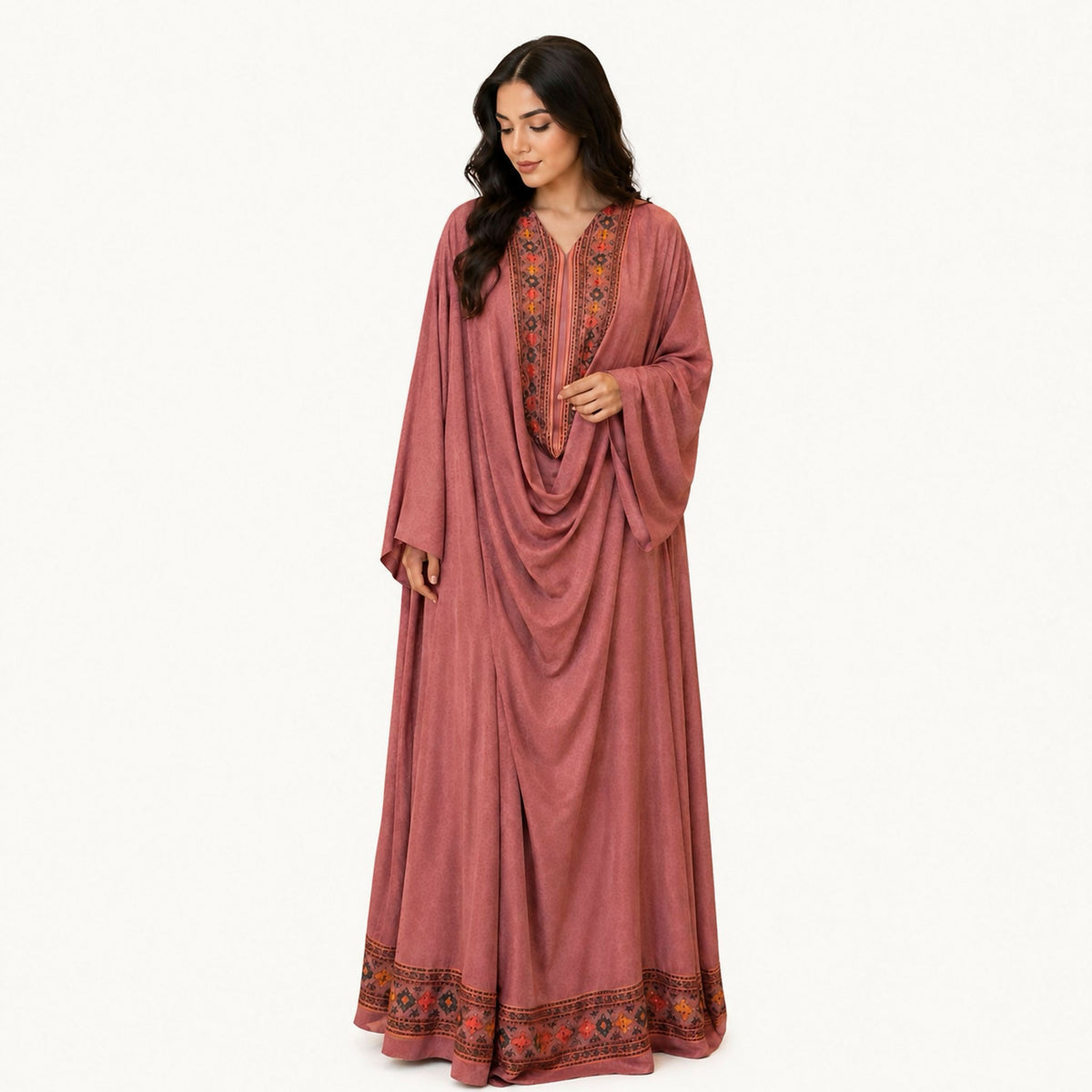 Indian silk jalabiya in light maroon with a butterfly-style cut, plus an inner waist tie and side gathering that accentuates the waistline cut. Hand wash or steam clean.