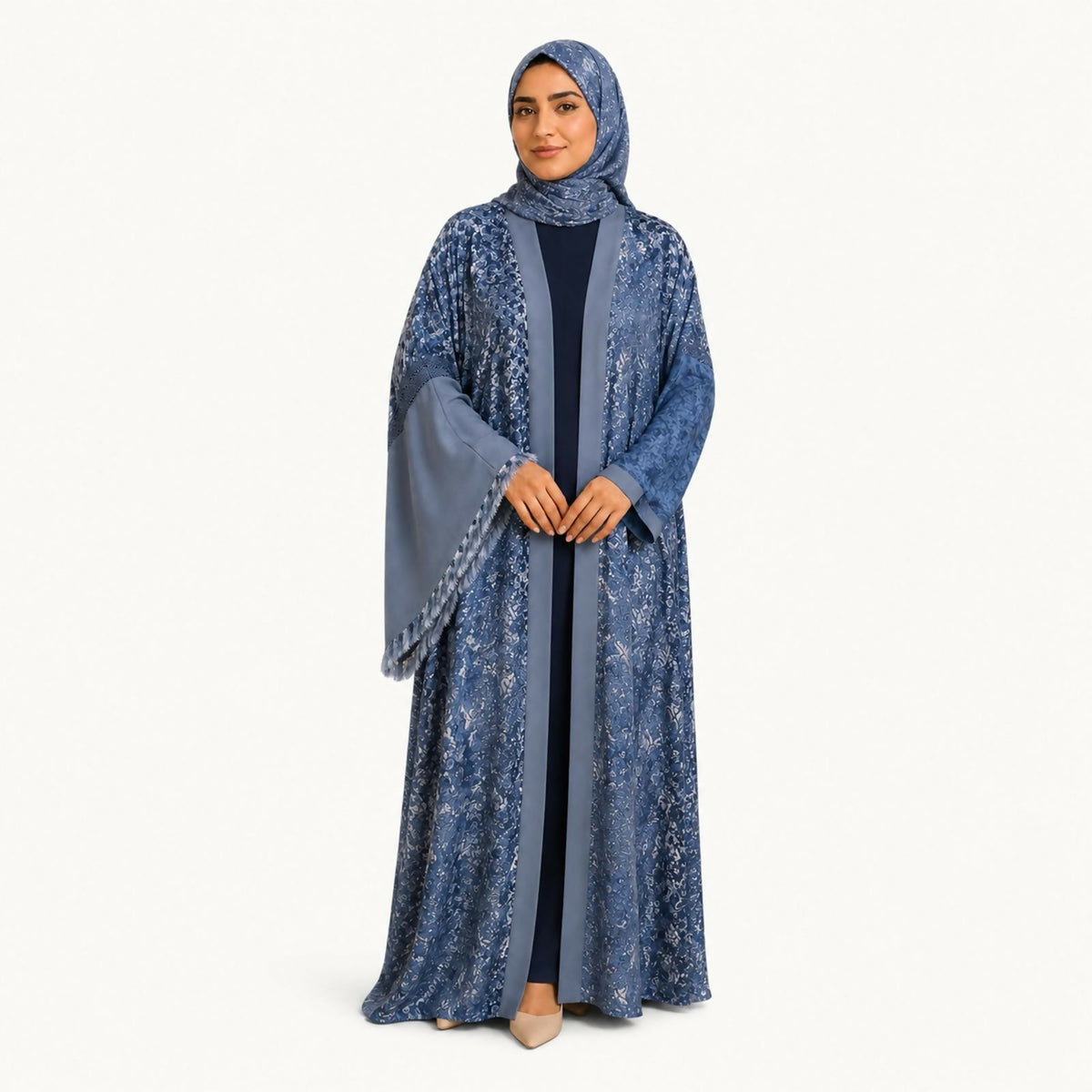 Open-front abaya in a steel-blue floral damask print over a solid navy inner dress, completed with a fringed matching shawl.
