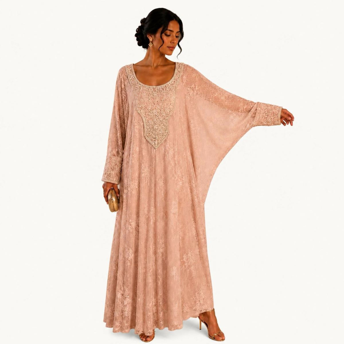 Blush pink lace dress with a round neckline fully embroidered in pearls and beads, wide kimono-style sleeves, and an allover lace pattern
