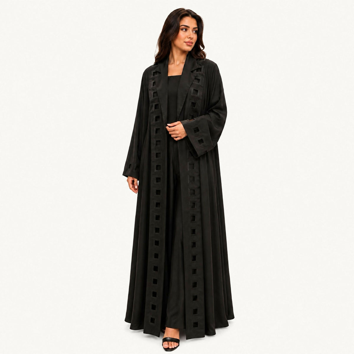 Black crepe abaya with an arch-shaped front cut in black and navy embroidery, with navy satin fabric as a front underlay. Works for summer and winter; hand wash or steam clean.