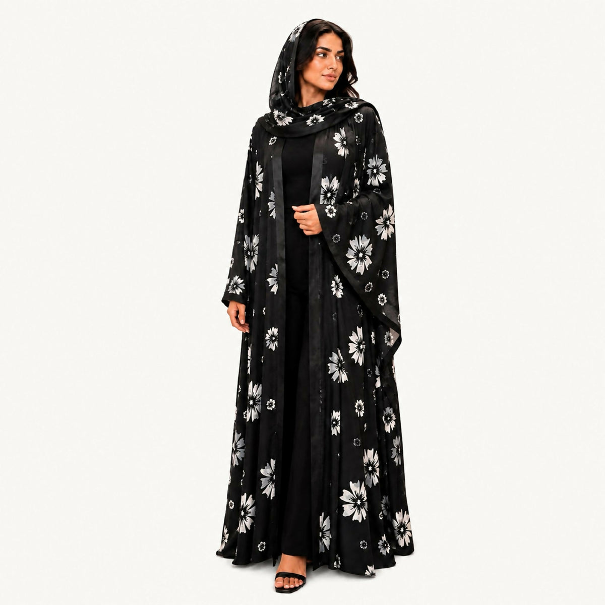 Indian silk abaya, bisht-style cut, in light blue with an off-white small floral print, square sleeves, loose and lightweight. Hand wash or steam clean.