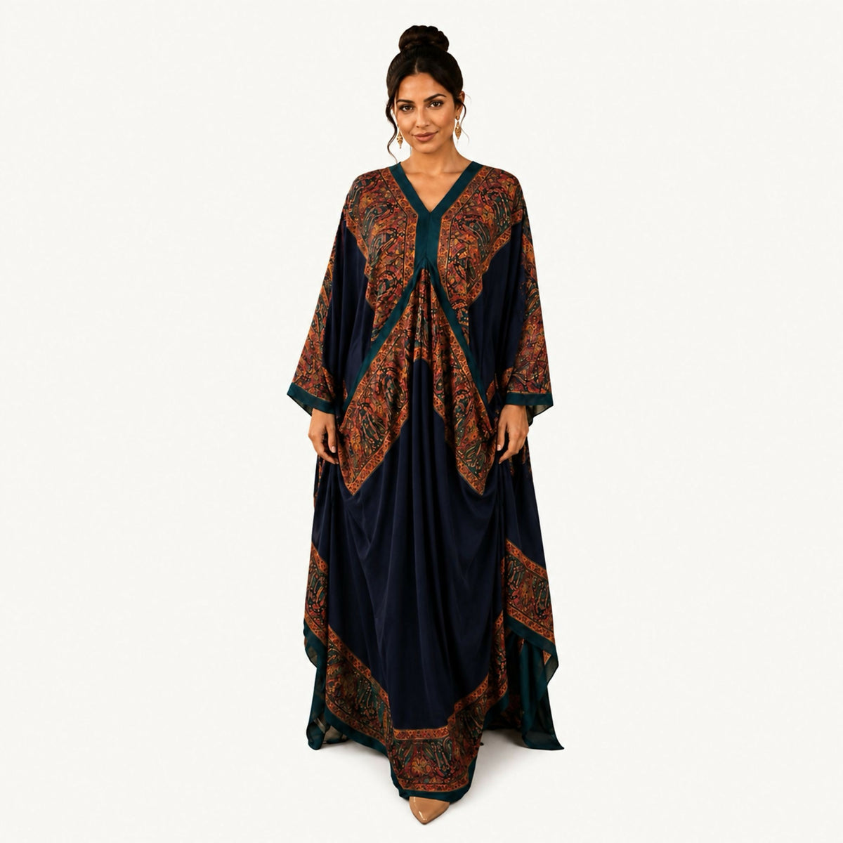 Indian silk jalabiya in olive green, long cut adjusted with a waist belt tie from the inside, with a panel falling from one shoulder resembling a butterfly, and the other sleeve gathered with elastic. Hand wash or steam clean.
