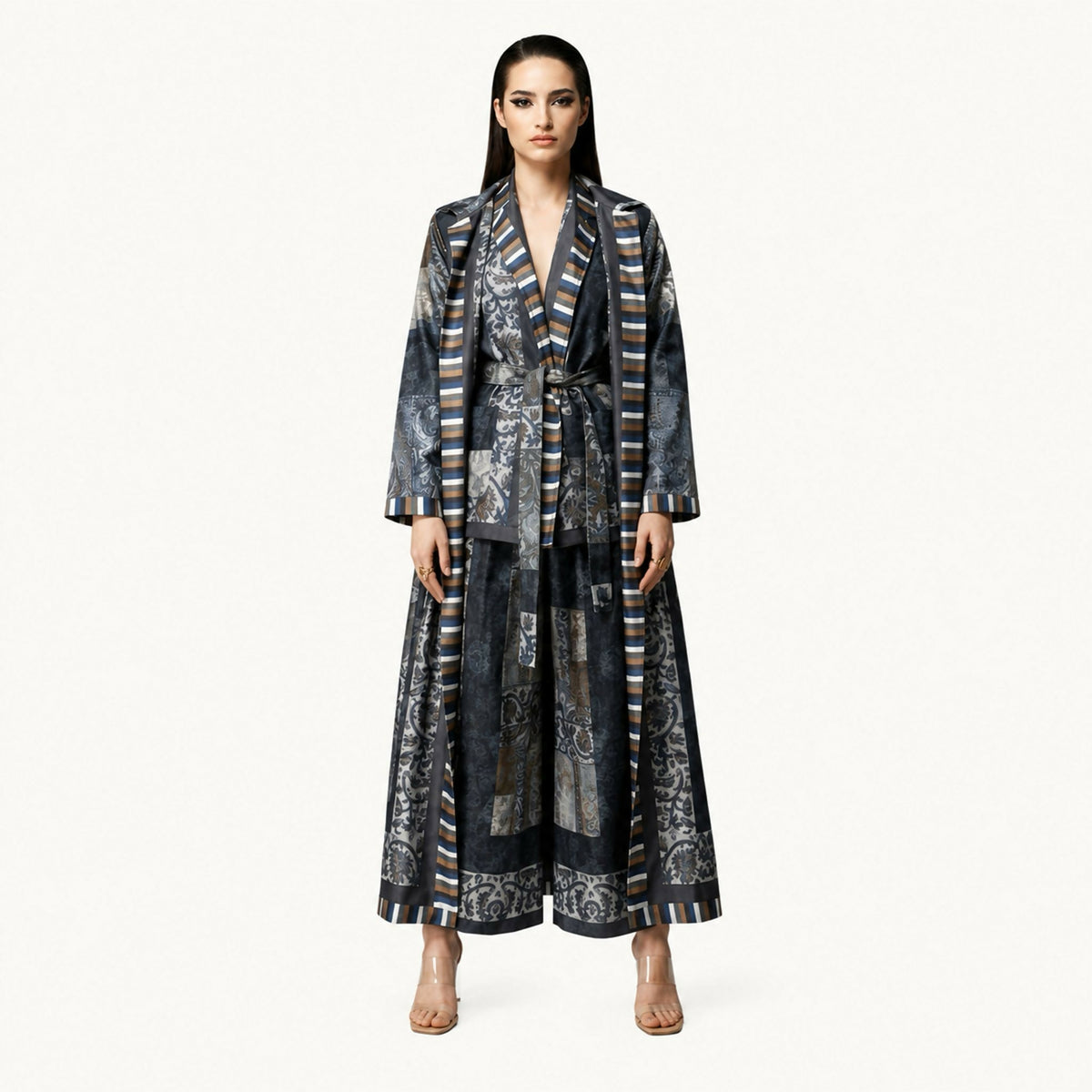 An elegant co-ord set featuring nature-inspired prints, long jacket and belted shirt, and wide-leg trousers, designed to combine comfort with timeless sophistication.