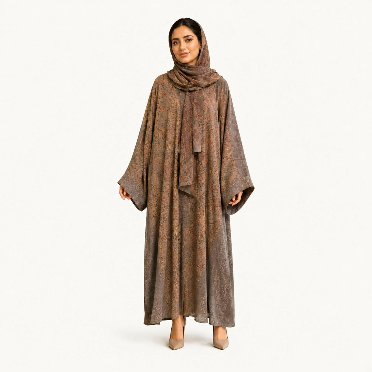 Flowing open abaya in an earthy taupe-brown paisley print with wide kimono-style sleeves, paired with a matching draped shawl.