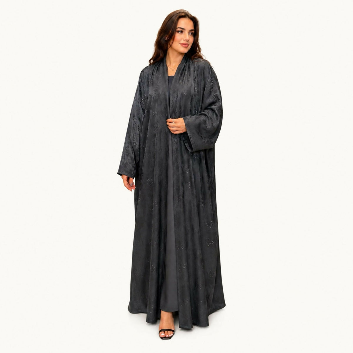 Indian silk abaya, bisht-style cut, in light blue with an off-white small floral print, square sleeves, loose and lightweight. Hand wash or steam clean.