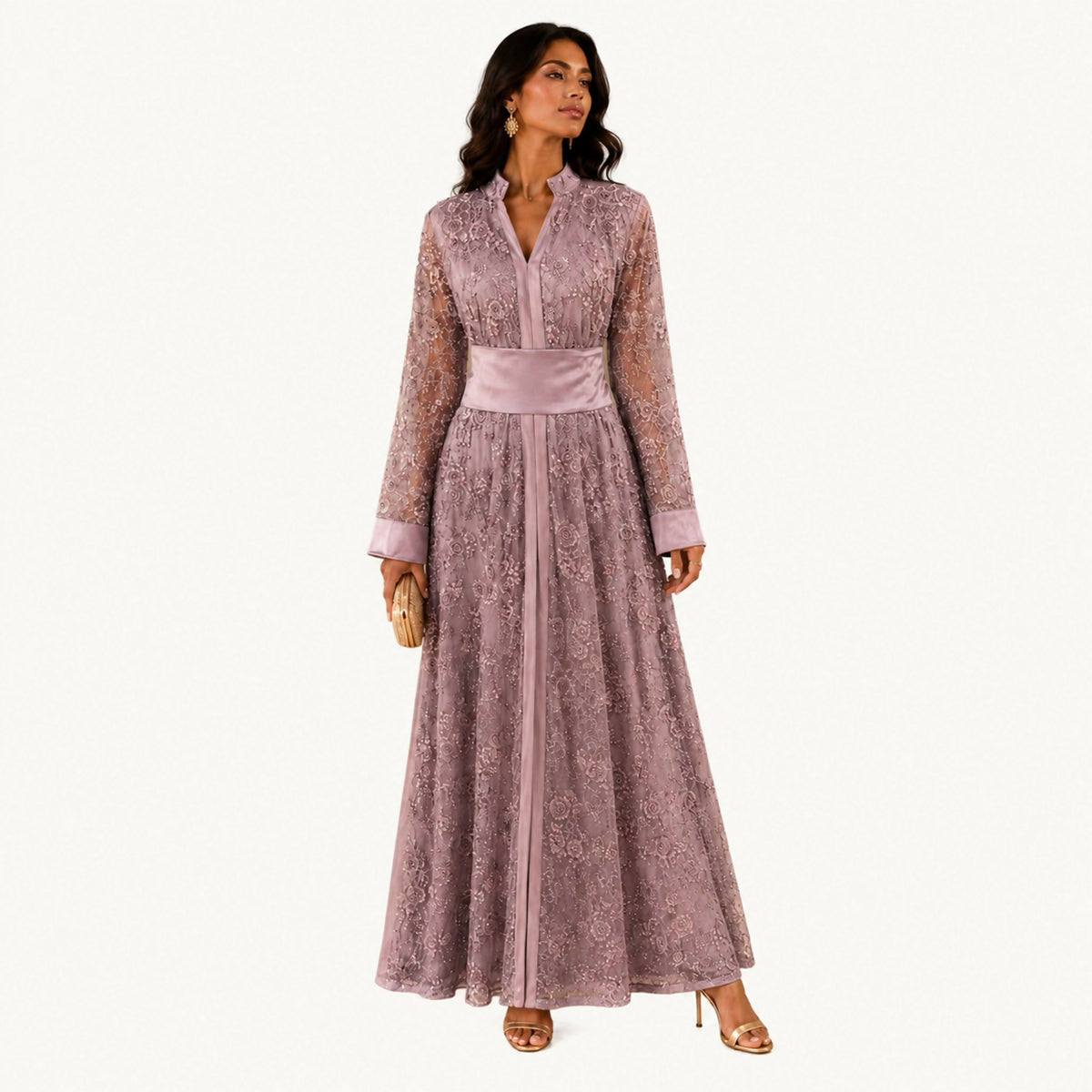 Deep aubergine/purple dress with a central front panel printed in orange, gold, and cream heritage patterns bordered with embroidery, long sleeves with matching embroidered cuffs