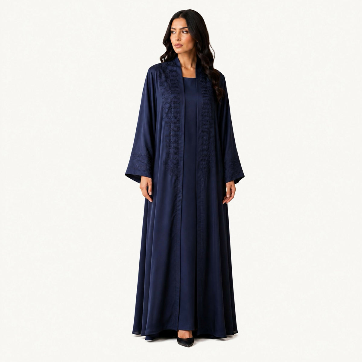 Navy crepe abaya with self-fabric seam lines plus black embroidery distributed on the front and back. Fabric works for both summer and winter; hand wash or steam clean.